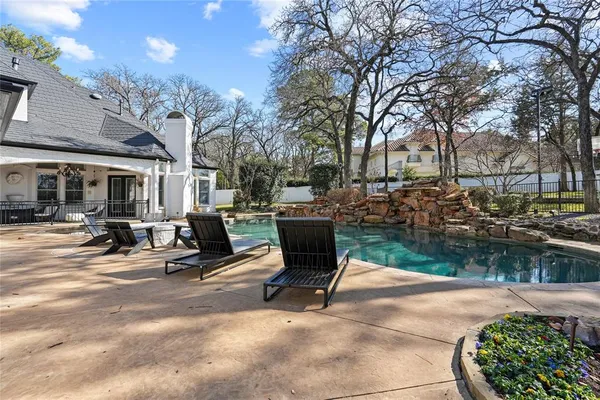 a view of a backyard with a patio
