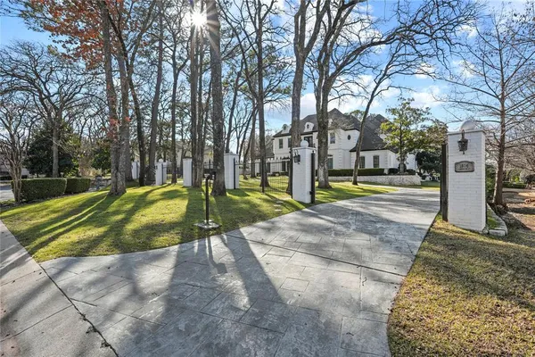 a view of a swimming pool with a lounge chair