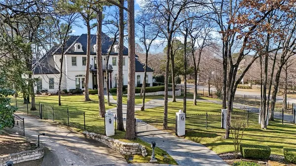 a view of a swimming pool with a backyard
