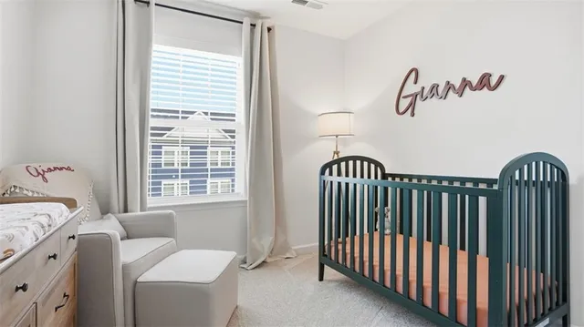 a view of a bedroom with a window