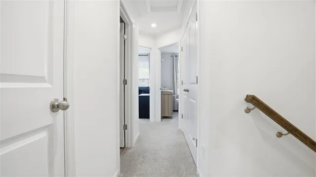 a view of a hallway with a room