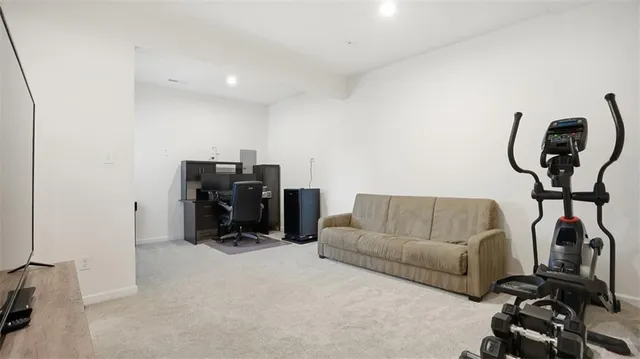a view of a livingroom with furniture and a couch