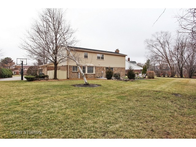 2109 Valley Road Northbrook, IL 60062 - Photo 11 of 13 a view of a house with a yard
