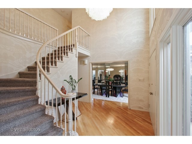 2109 Valley Road Northbrook, IL 60062 - Photo 2 of 13 a view of entryway and hall with wooden floor