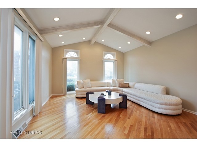 2109 Valley Road Northbrook, IL 60062 - Photo 3 of 13 a living room with furniture and a wooden floor