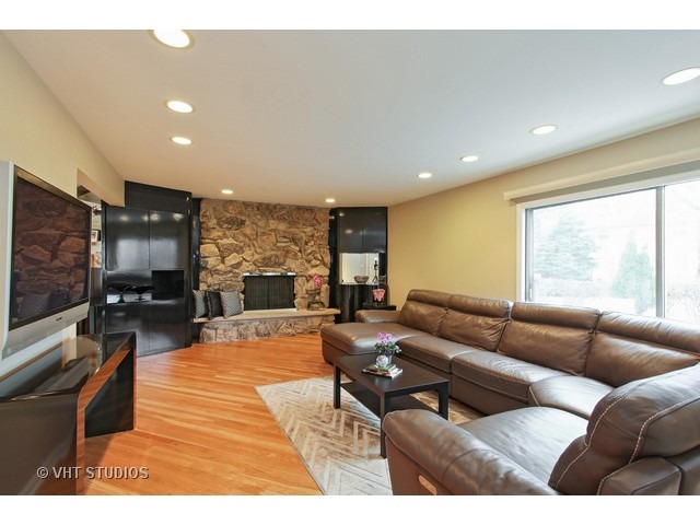 2109 Valley Road Northbrook, IL 60062 - Photo 6 of 13 a living room with furniture and a flat screen tv