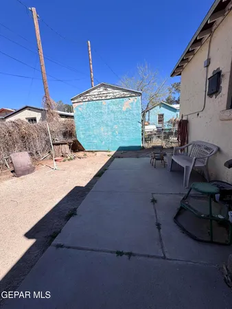 a view of a terrace with chairs