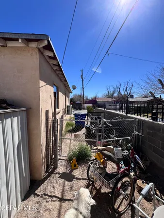 a view of a pathway with a yard