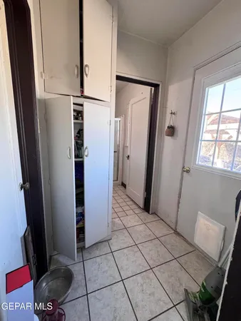 a bathroom with a toilet a sink and shower