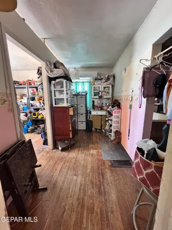 a room with furniture and a mirror