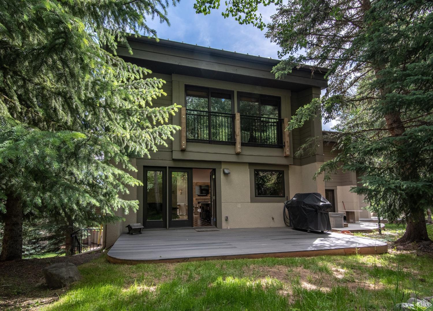 950 Red Sandstone Road, Unit 40 Vail, CO 81657 - Photo 11 of 23 a view of house with yard and outdoor seating