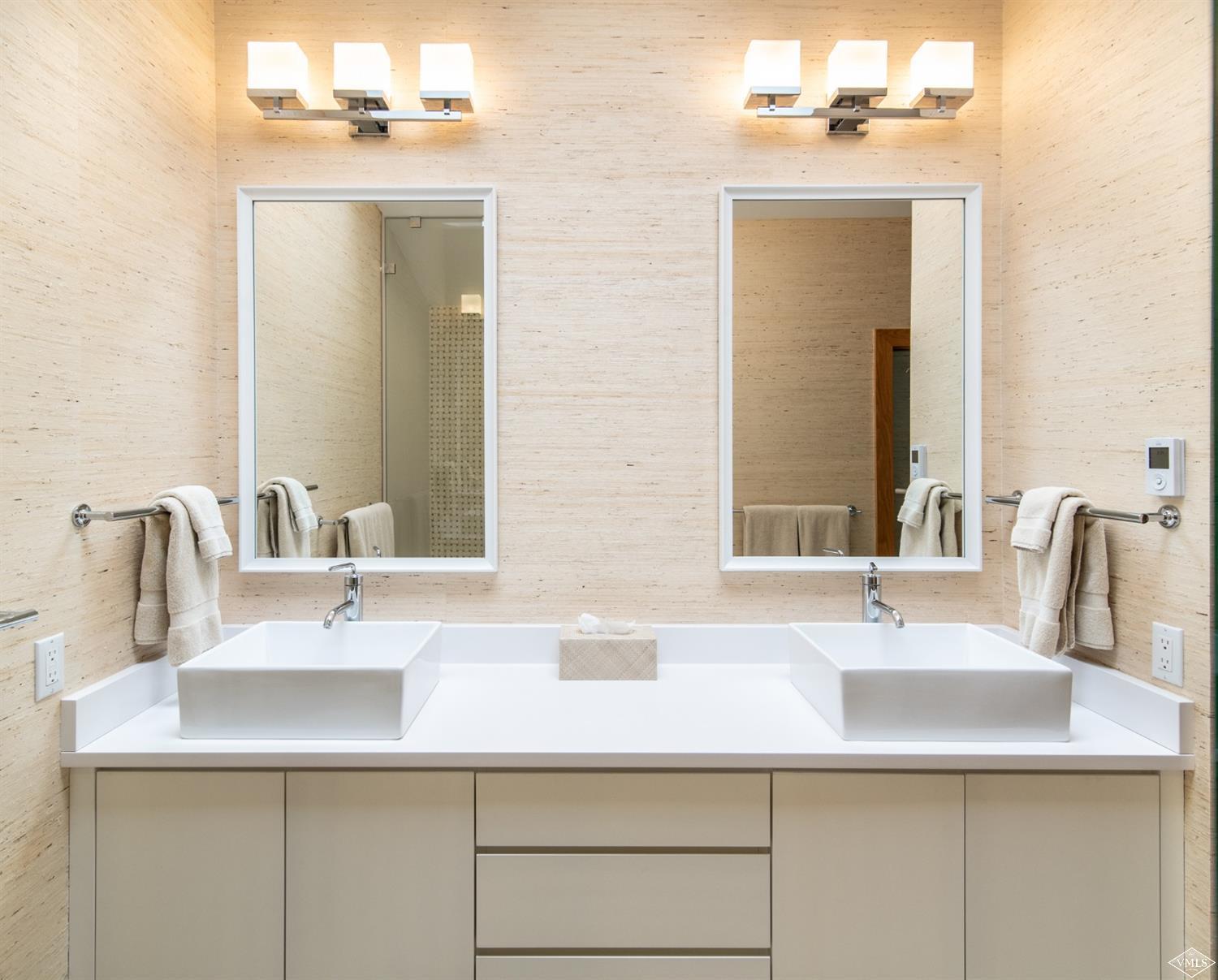 950 Red Sandstone Road, Unit 40 Vail, CO 81657 - Photo 15 of 23 a bathroom with a sink and a mirror