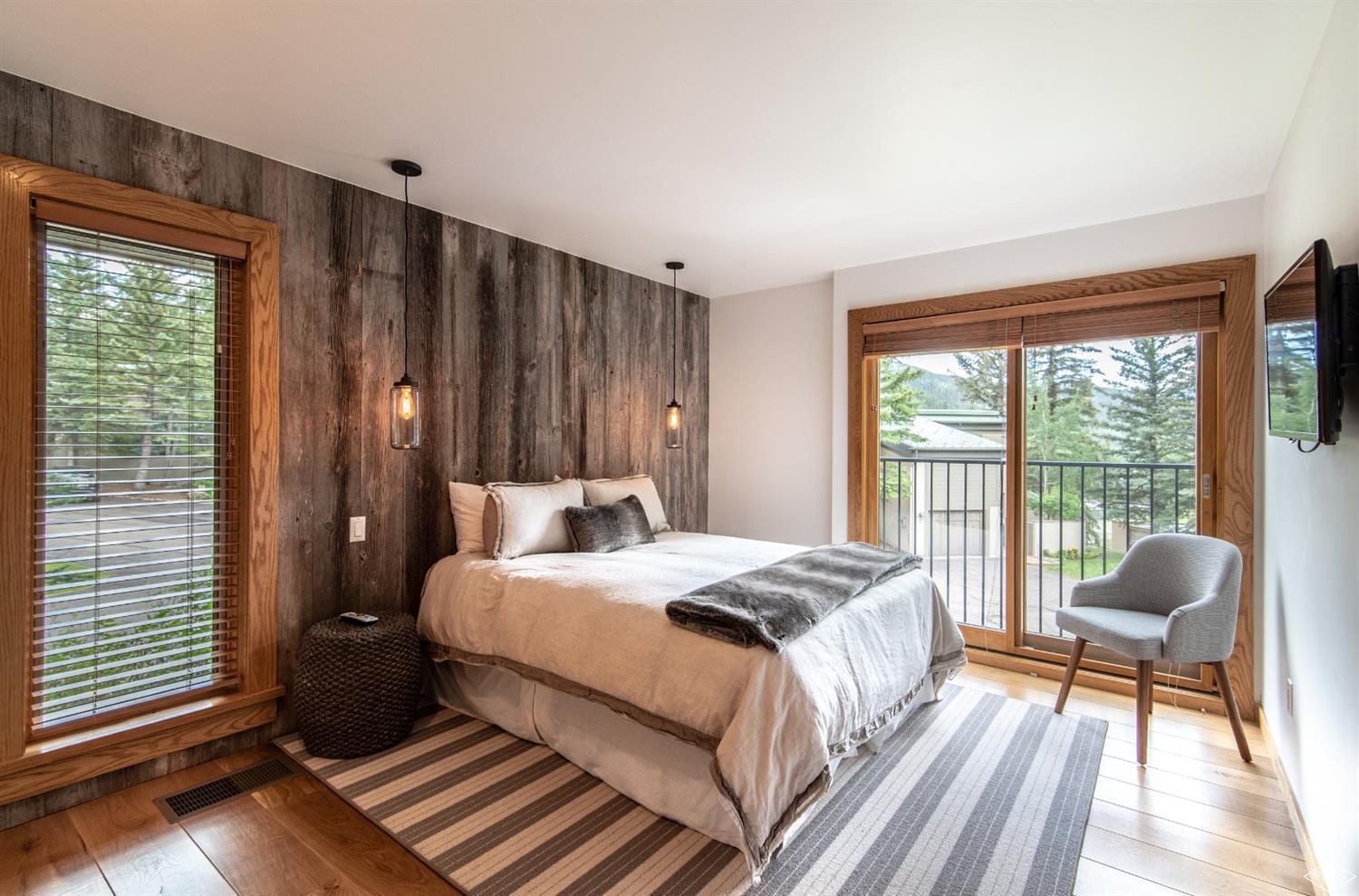 950 Red Sandstone Road, Unit 40 Vail, CO 81657 - Photo 16 of 23 a bedroom with a bed and a window