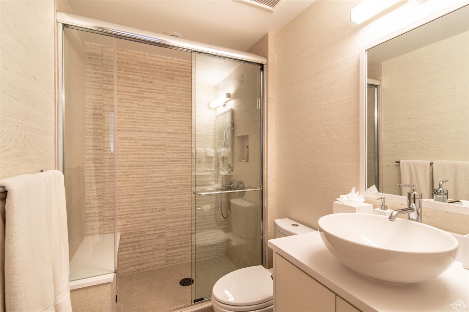 950 Red Sandstone Road, Unit 40 Vail, CO 81657 - Photo 18 of 23 a bathroom with a sink toilet and shower