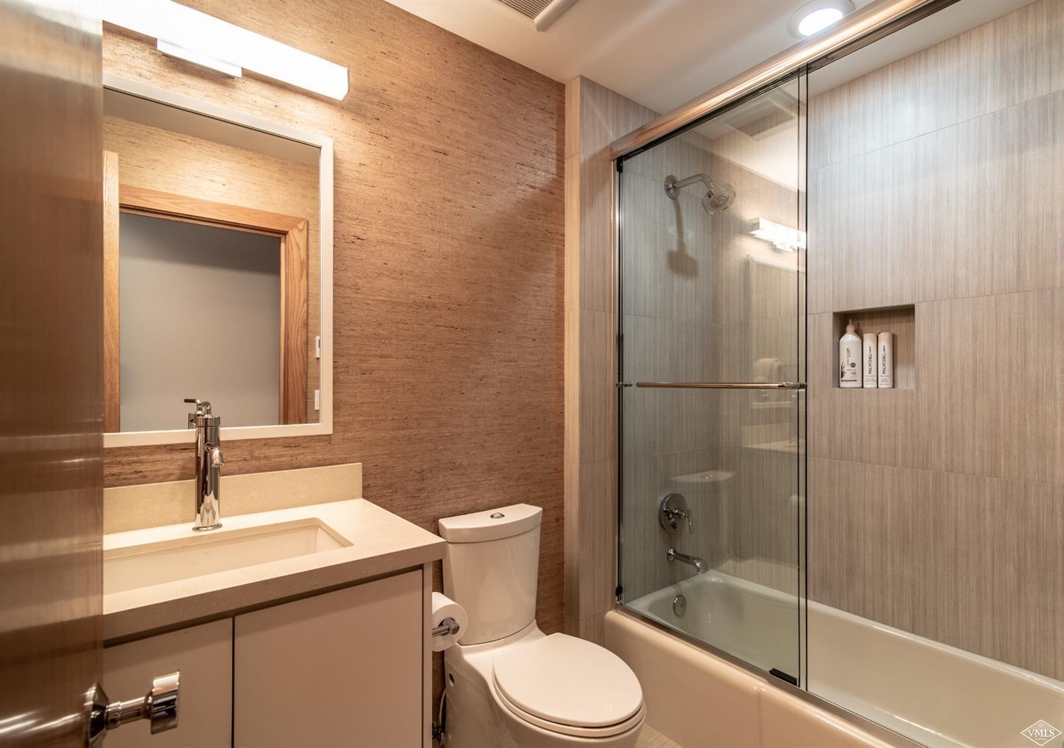 950 Red Sandstone Road, Unit 40 Vail, CO 81657 - Photo 19 of 23 a bathroom with a sink a toilet and shower
