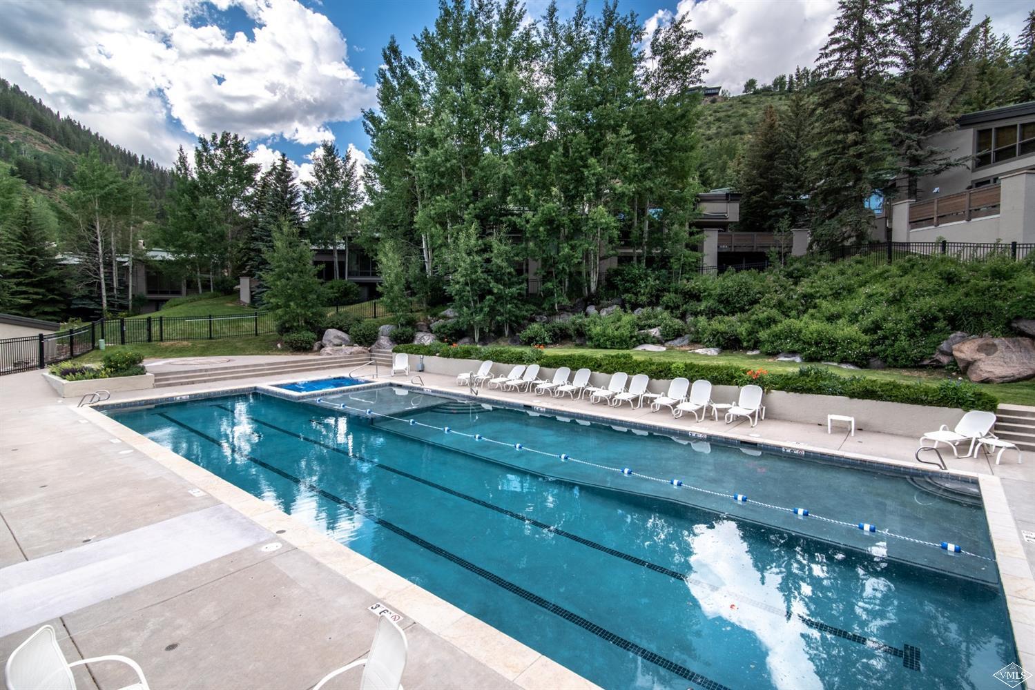 950 Red Sandstone Road, Unit 40 Vail, CO 81657 - Photo 22 of 23 a view of a park with large trees