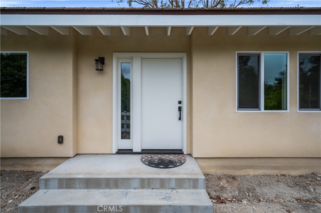 60 Ranchview Road, Unit 1/2 Rolling Hills Estates, CA 90274 - Photo 15 of 21 a view of a entryway door of the house