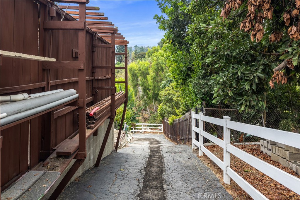 60 Ranchview Road, Unit 1/2 Rolling Hills Estates, CA 90274 - Photo 20 of 21 a view of a balcony with chairs