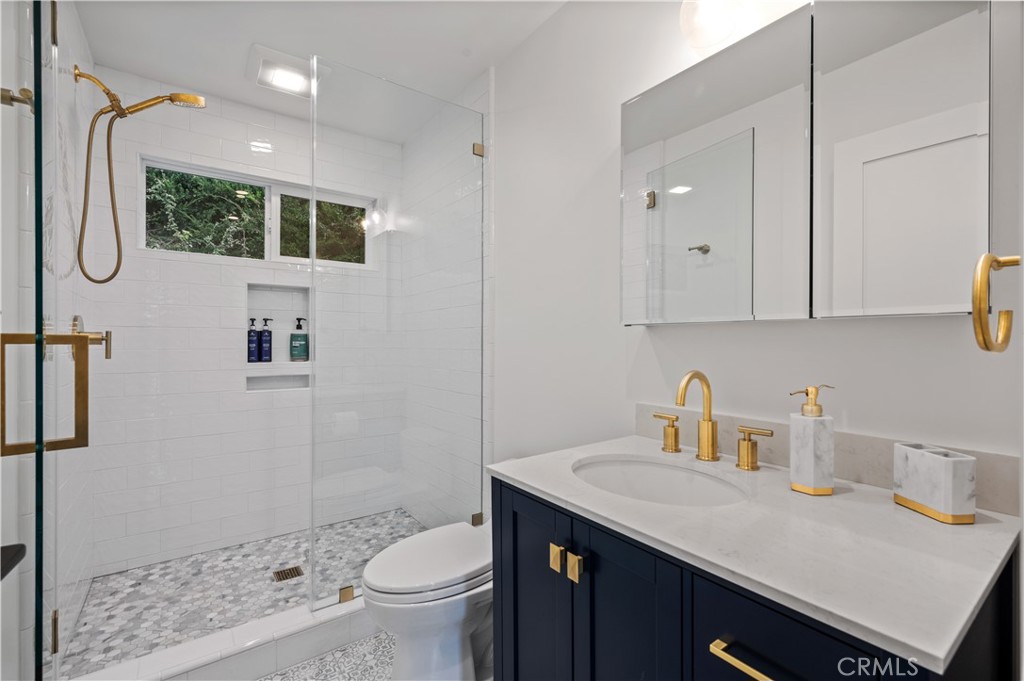 60 Ranchview Road, Unit 1/2 Rolling Hills Estates, CA 90274 - Photo 9 of 21 a bathroom with a sink toilet and shower