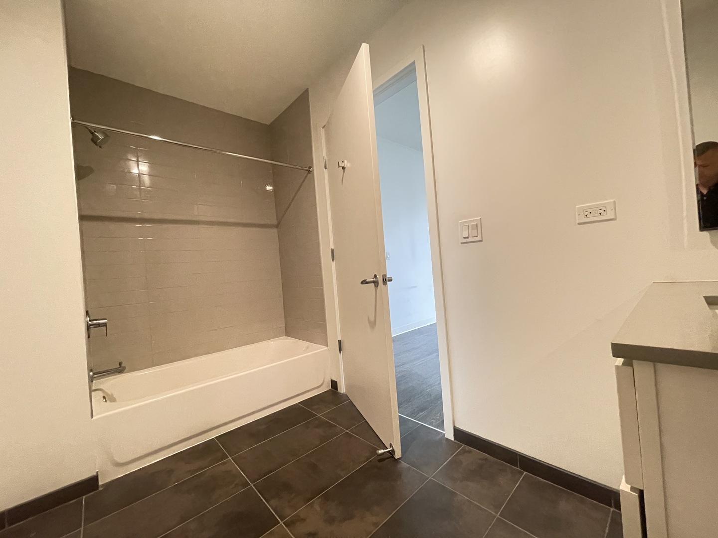 Undisclosed Address Chicago, IL 60642 - Photo 12 of 25 a bathroom with a bathtub and a shower