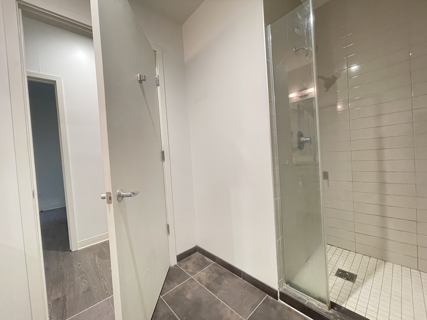 Undisclosed Address Chicago, IL 60642 - Photo 19 of 25 a bathroom with a shower