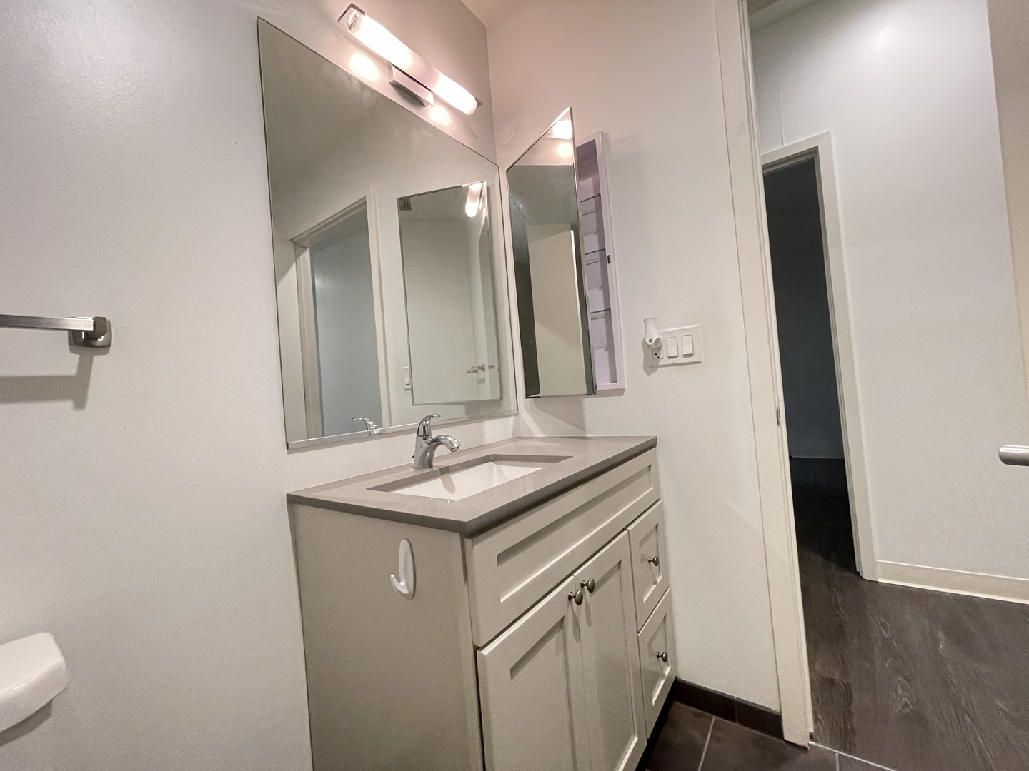 Undisclosed Address Chicago, IL 60642 - Photo 20 of 25 a bathroom with a sink and a mirror