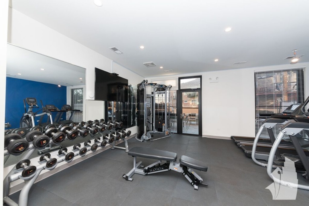 Undisclosed Address Chicago, IL 60642 - Photo 25 of 25 a view of a room with gym equipment