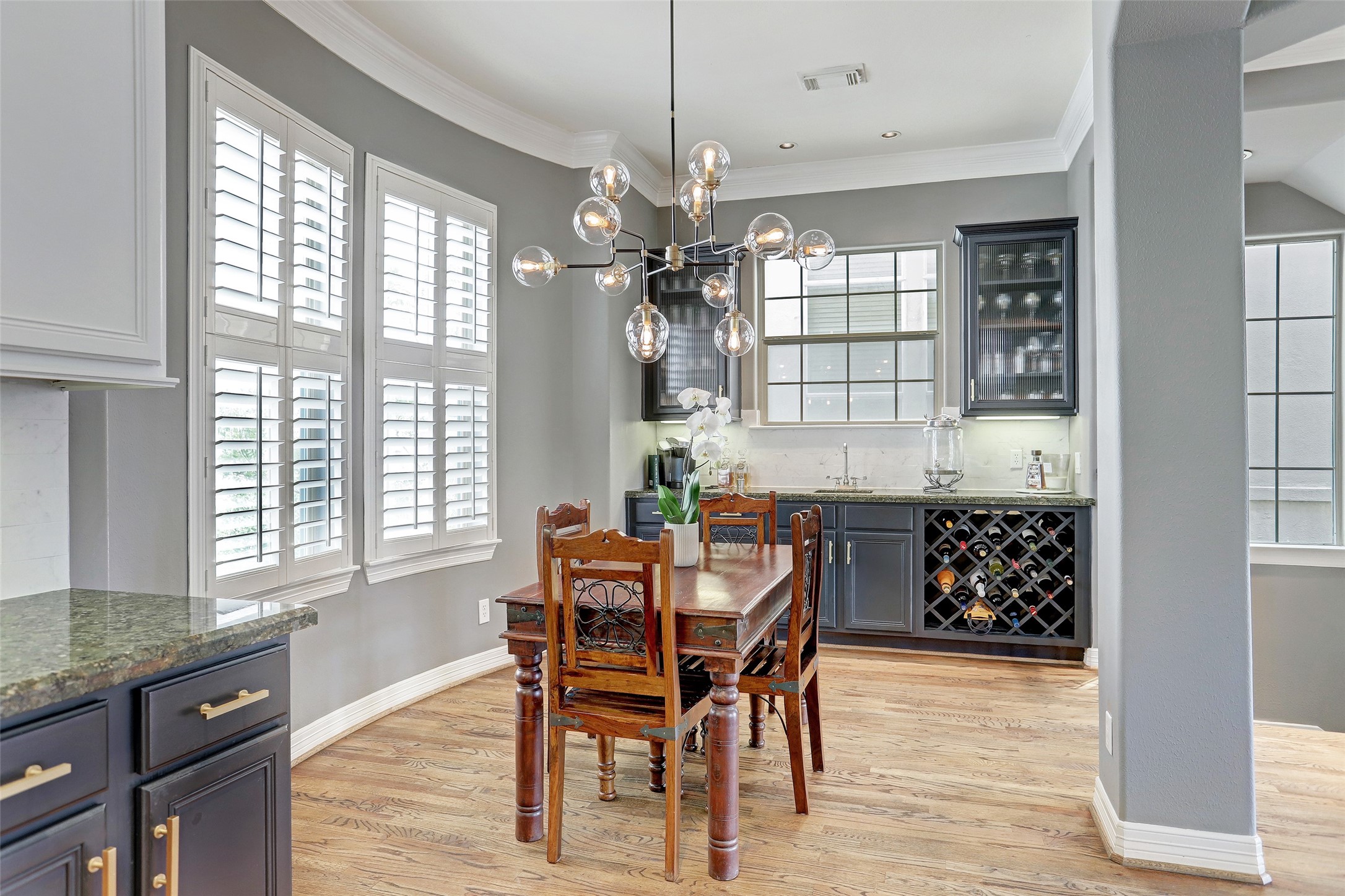 2810 Helena Street Houston, TX 77006 - Photo 7 of 16 a view of a dining room with furniture window and wooden floor