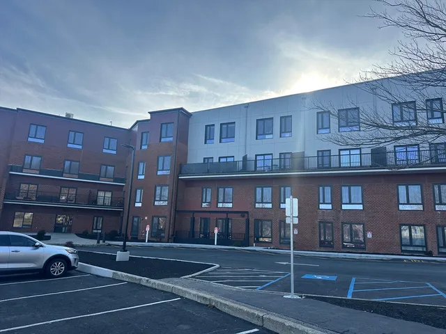 a front view of a building with street view