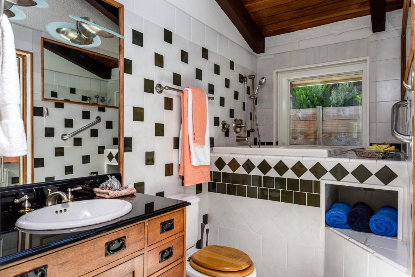 248 Exeter Avenue San Carlos, CA 94070 - Photo 19 of 28 a bathroom with a sink a bathtub and a shower
