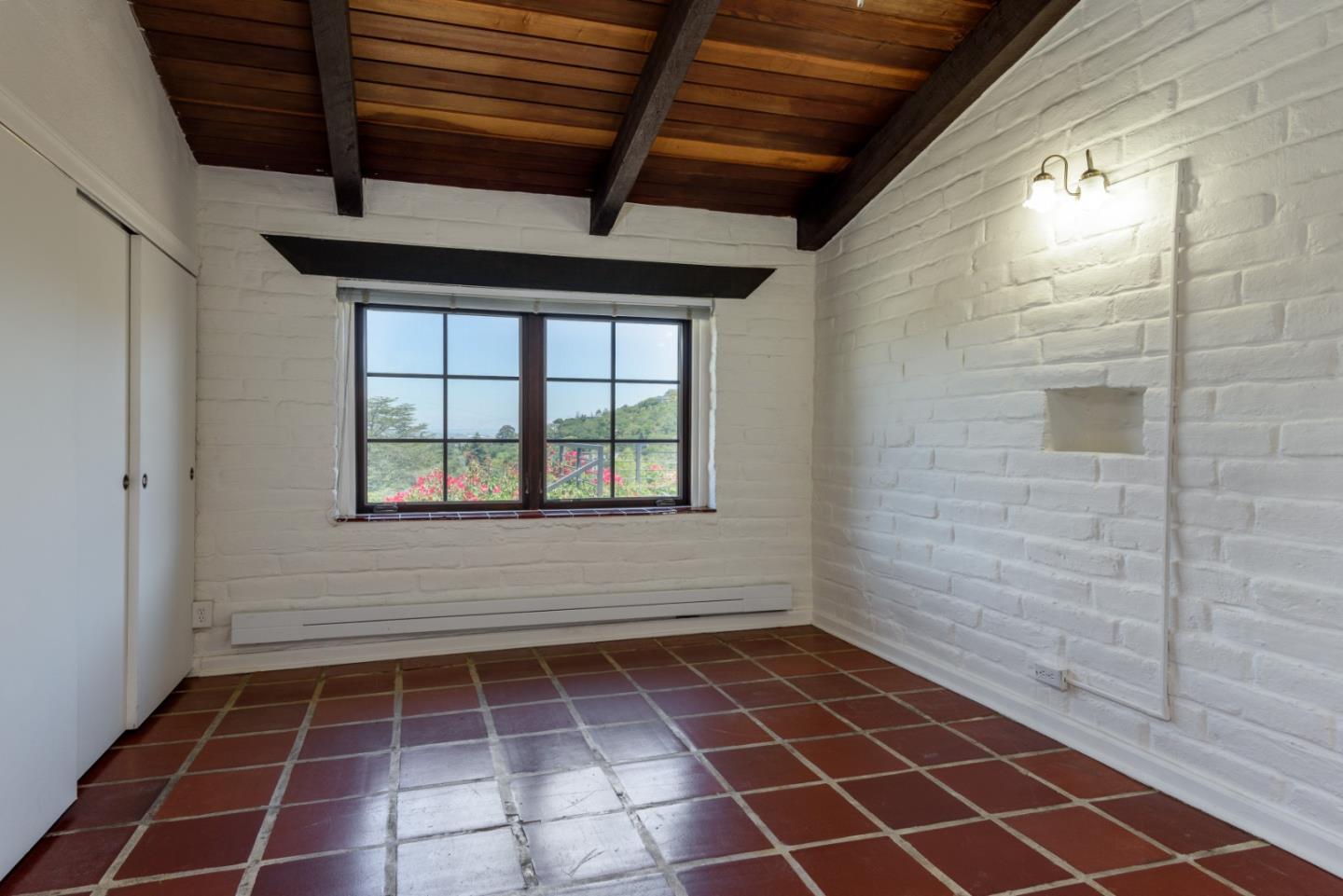 248 Exeter Avenue San Carlos, CA 94070 - Photo 20 of 28 a view of an empty room with a window