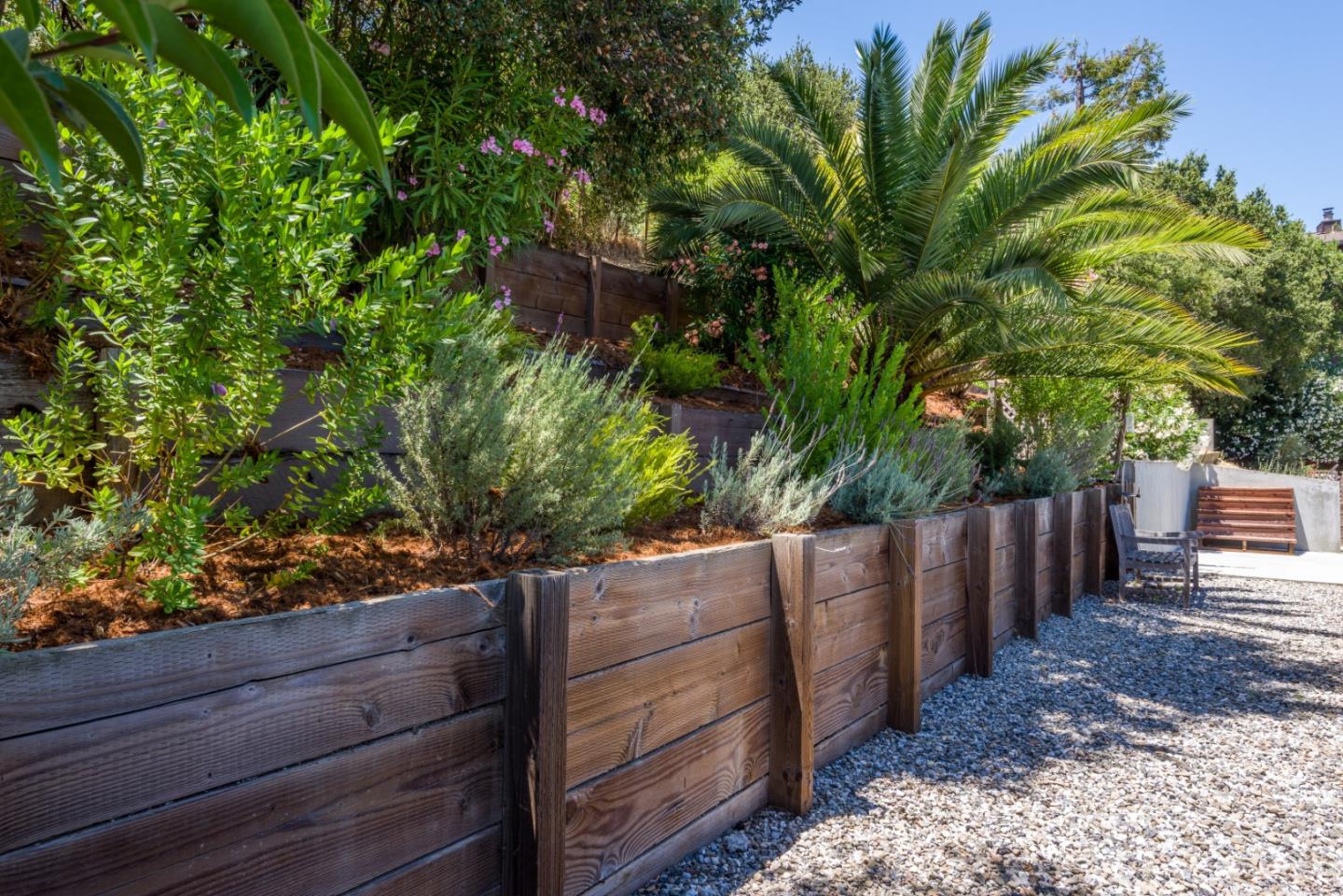 248 Exeter Avenue San Carlos, CA 94070 - Photo 23 of 28 a view of a wooden fence and trees
