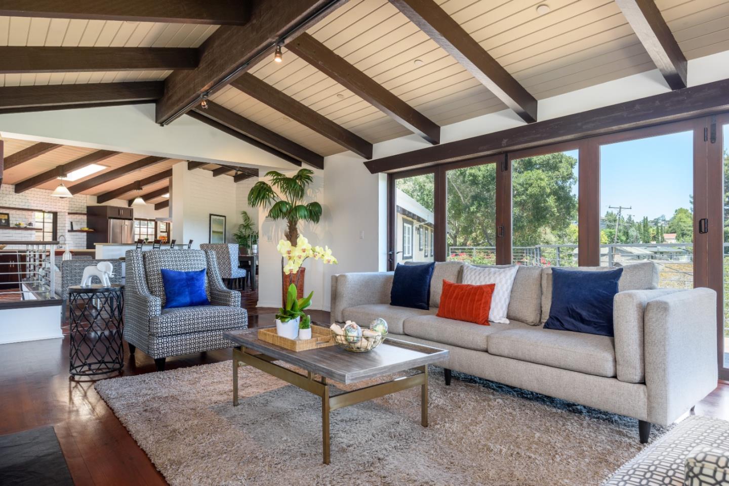 248 Exeter Avenue San Carlos, CA 94070 - Photo 7 of 28 a living room with furniture and a floor to ceiling window