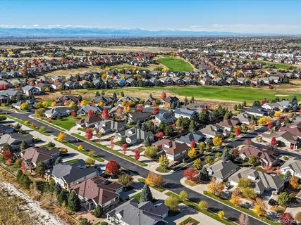 an aerial view of a city with lots of residential buildings