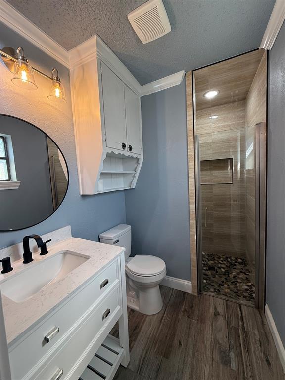 229 Travis Lane Hewitt, TX 76643 - Photo 13 of 17 a bathroom with a sink and a mirror