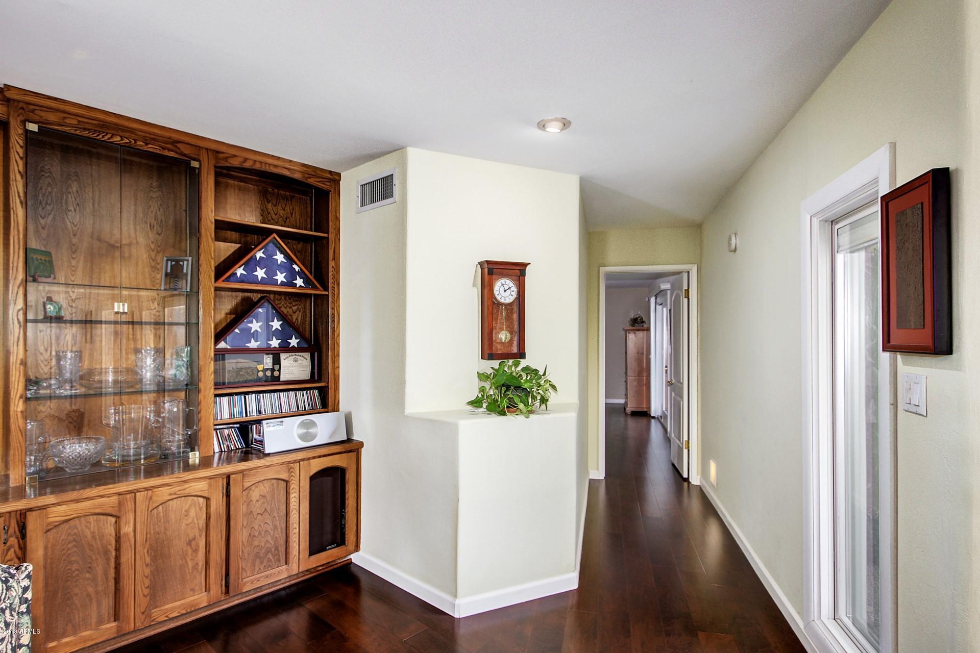 5244 East Osborn Road Phoenix, AZ 85018 - Photo 10 of 37 great room into hall to master