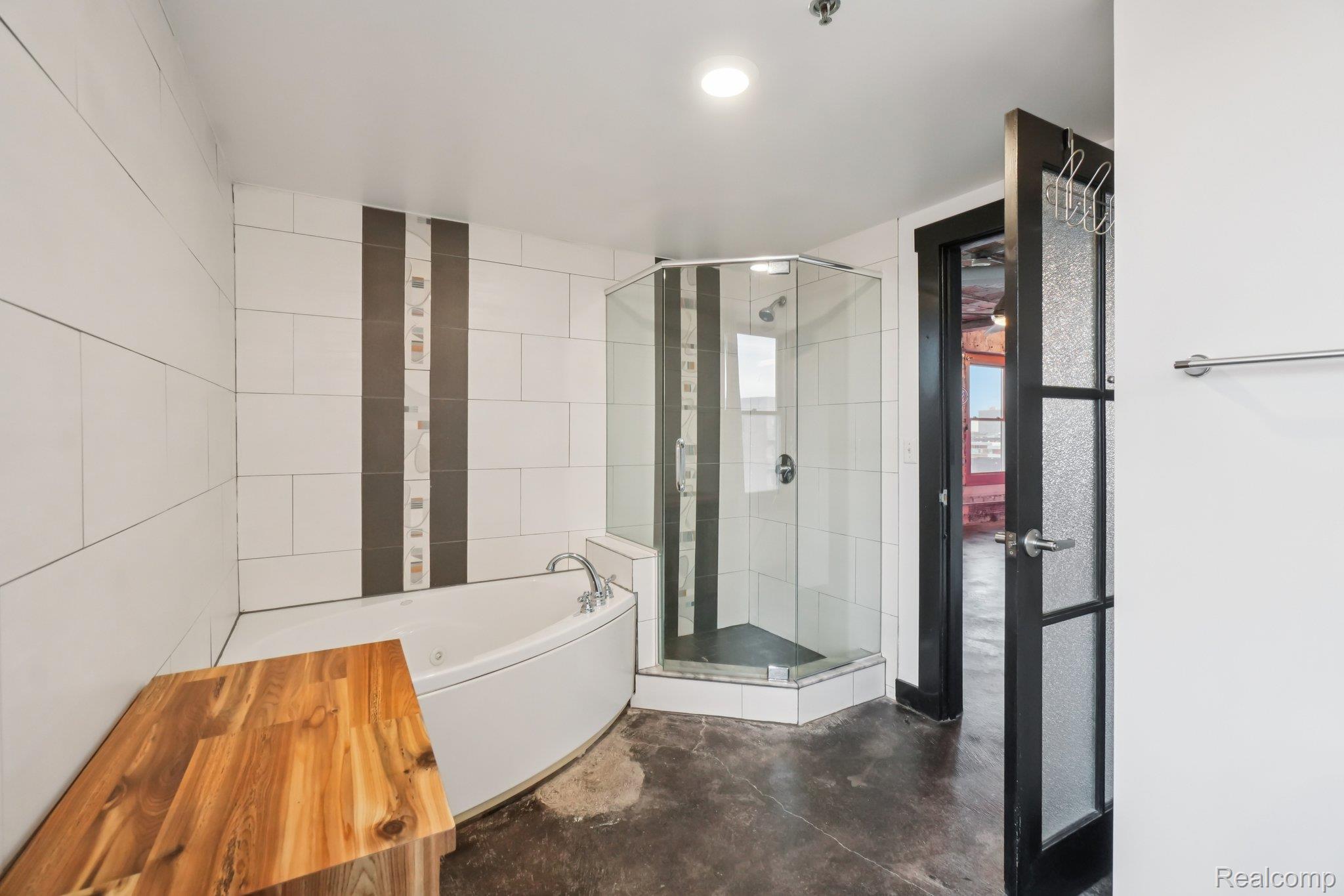 2915 John R Street Detroit, MI 48201 - Photo 12 of 30 Full bathroom with a bath and a shower stall