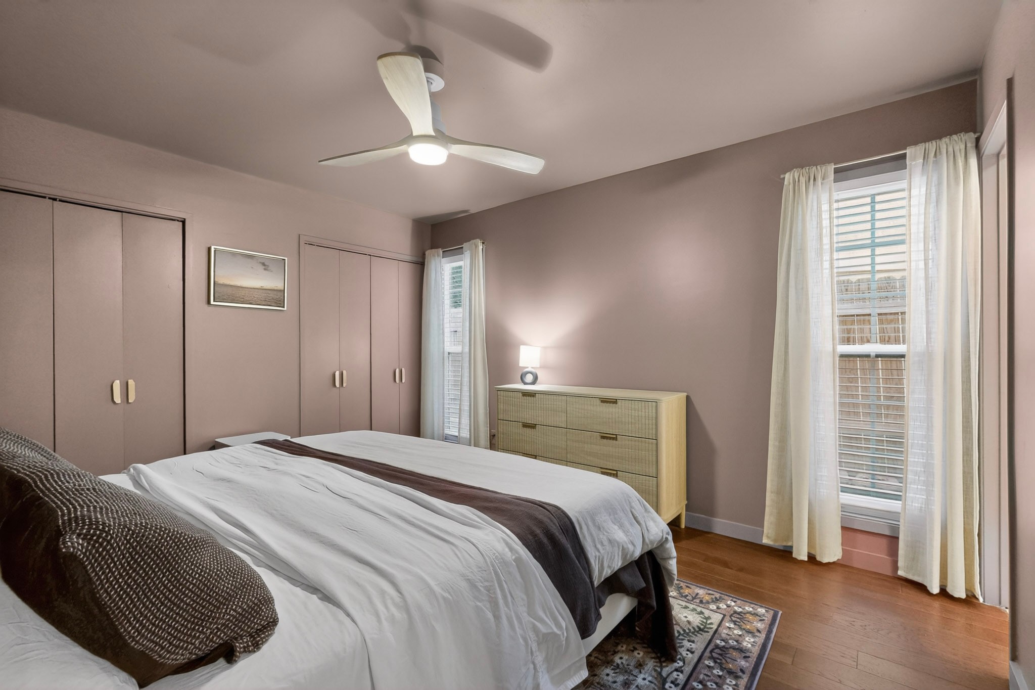 5541 Pine Place Austin, TX 78744 - Photo 18 of 33 Hardwood-finish flooring, recessed lighting, and a ceiling fan with integrated lighting