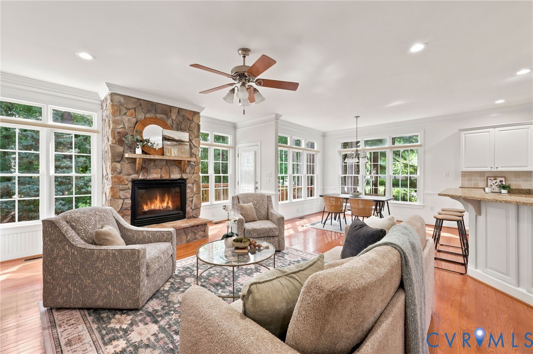 4701 Regal Oaks Road Glen Allen, VA 23059 - Photo 13 of 60 a living room with furniture and a fireplace