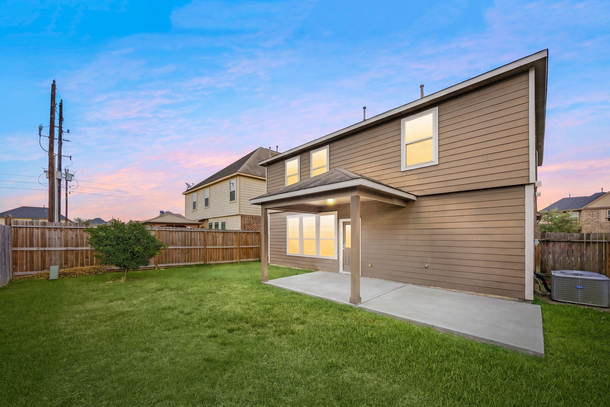 29322 Indian Clearing Spring, TX 77386 - Photo 5 of 47 a front view of a house with a yard