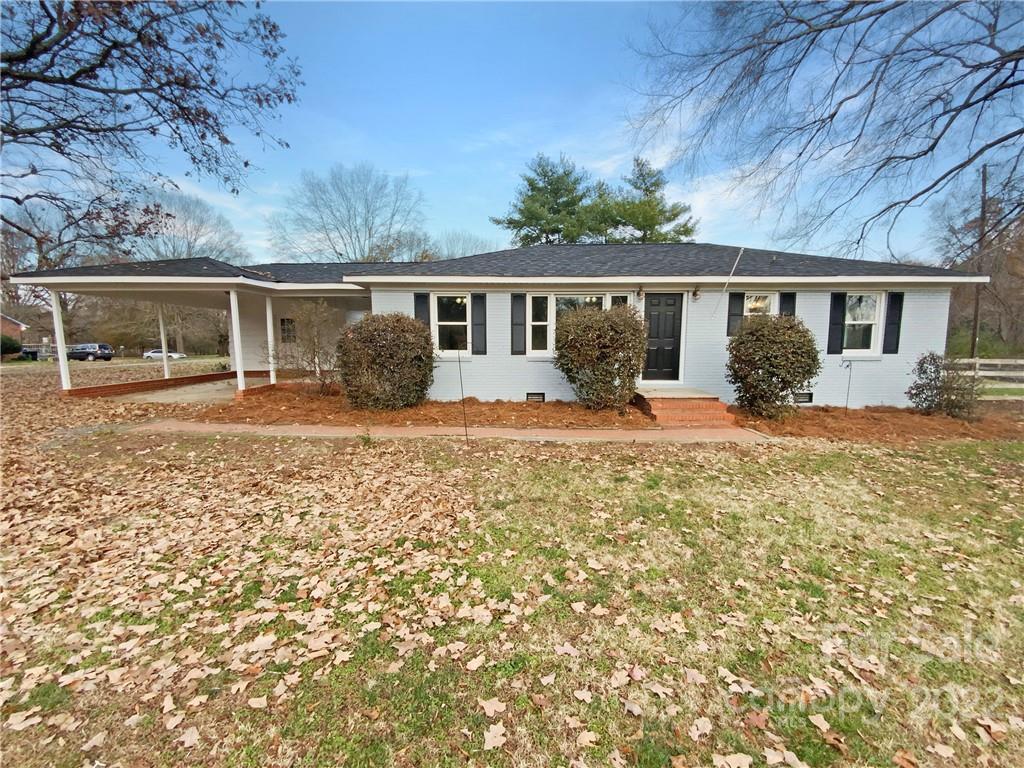 4408 Griffith Road Monroe, NC 28112 - Photo 1 of 17 front view of a house with a yard