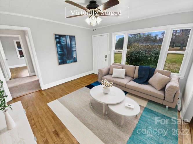 4408 Griffith Road Monroe, NC 28112 - Photo 2 of 17 a living room with furniture and a large window