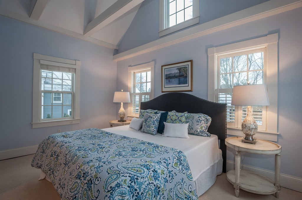 6 Leavitt Street Hingham, MA 02043 - Photo 13 of 28 a bedroom with a large bed and a window