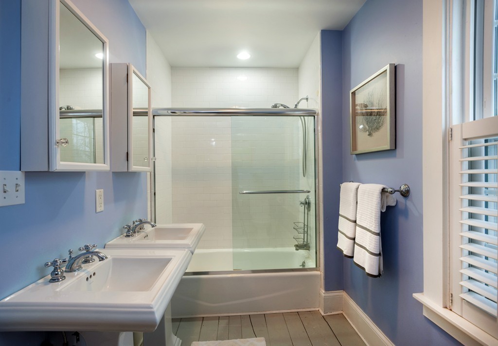 6 Leavitt Street Hingham, MA 02043 - Photo 18 of 28 a bathroom with a sink a toilet and shower