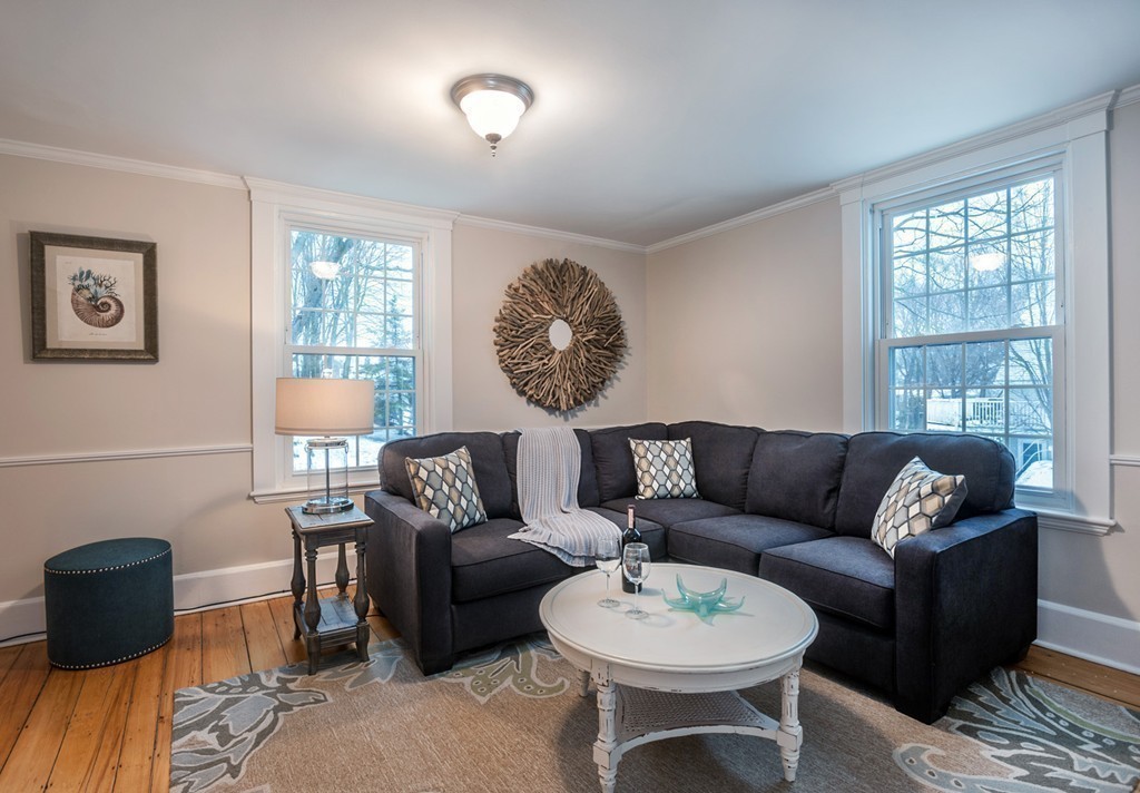 6 Leavitt Street Hingham, MA 02043 - Photo 8 of 28 a living room with furniture a rug and a window