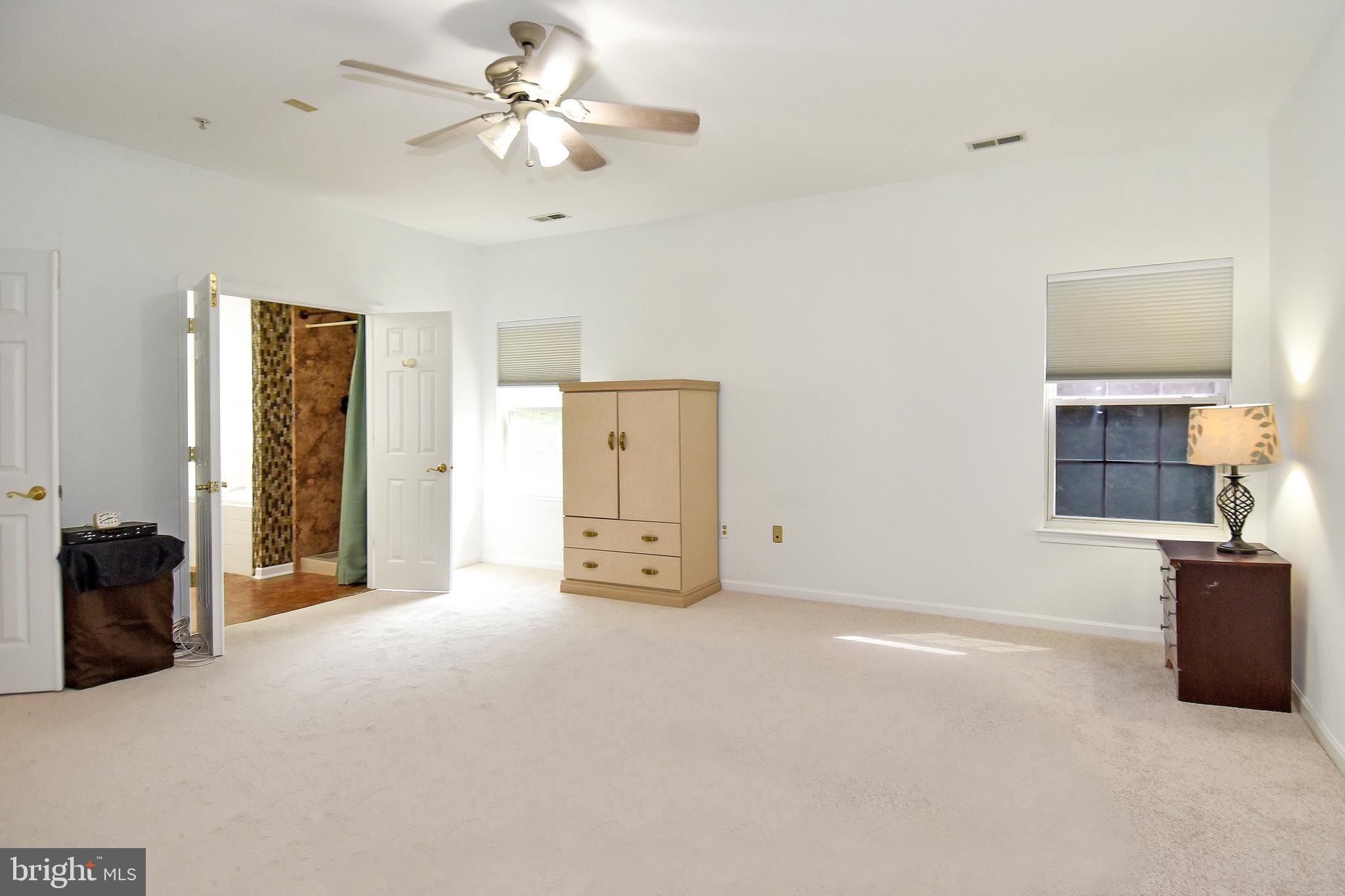 9809 Pheasant Run Court Laurel, MD 20708 - Photo 22 of 52 PRIMARY OWNERS EN-SUITE HAS LIGHTED CEILING FAN