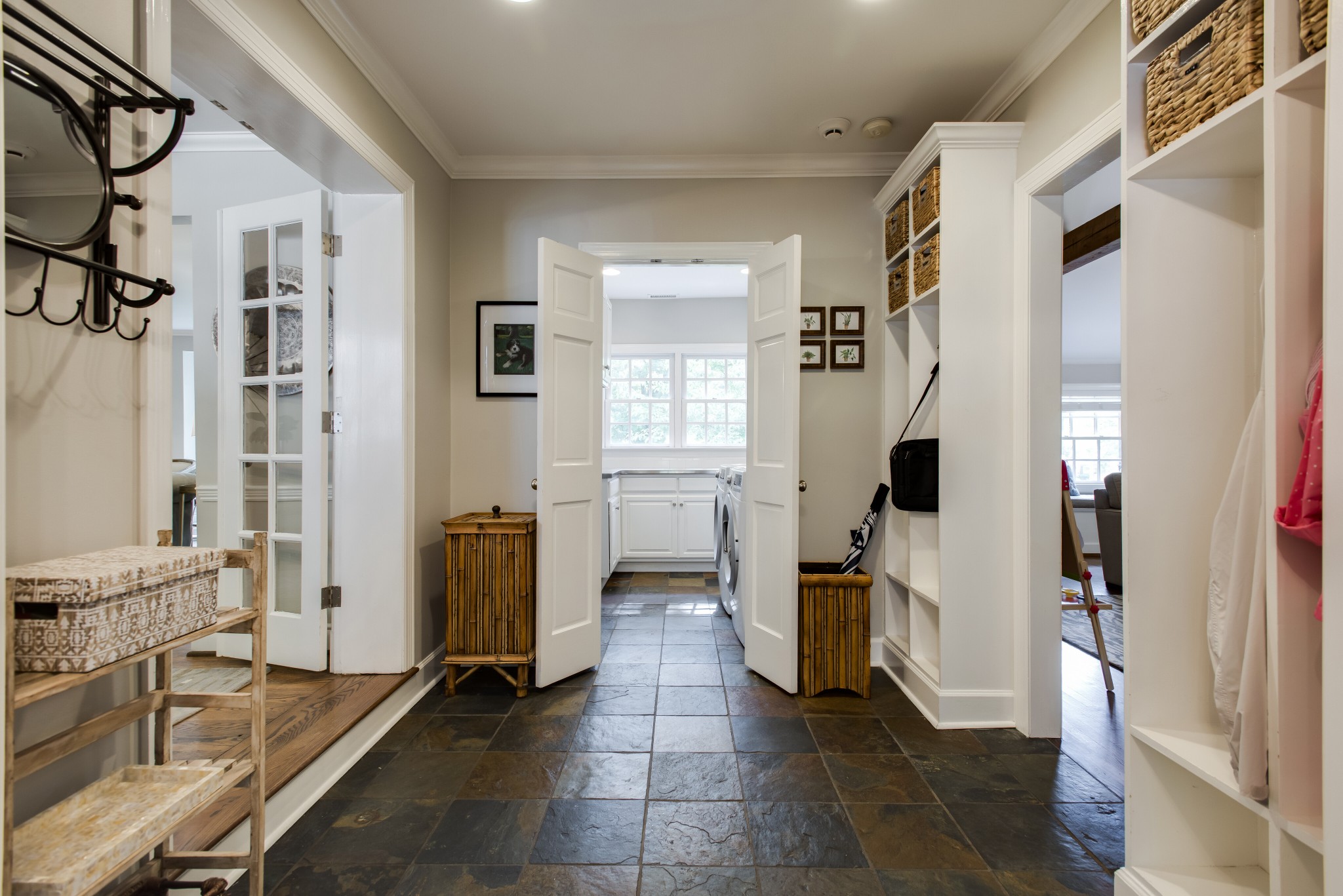 4105 Estes Road Nashville, TN 37215 - Photo 19 of 34 a hallway with a white stove a refrigerator and a window