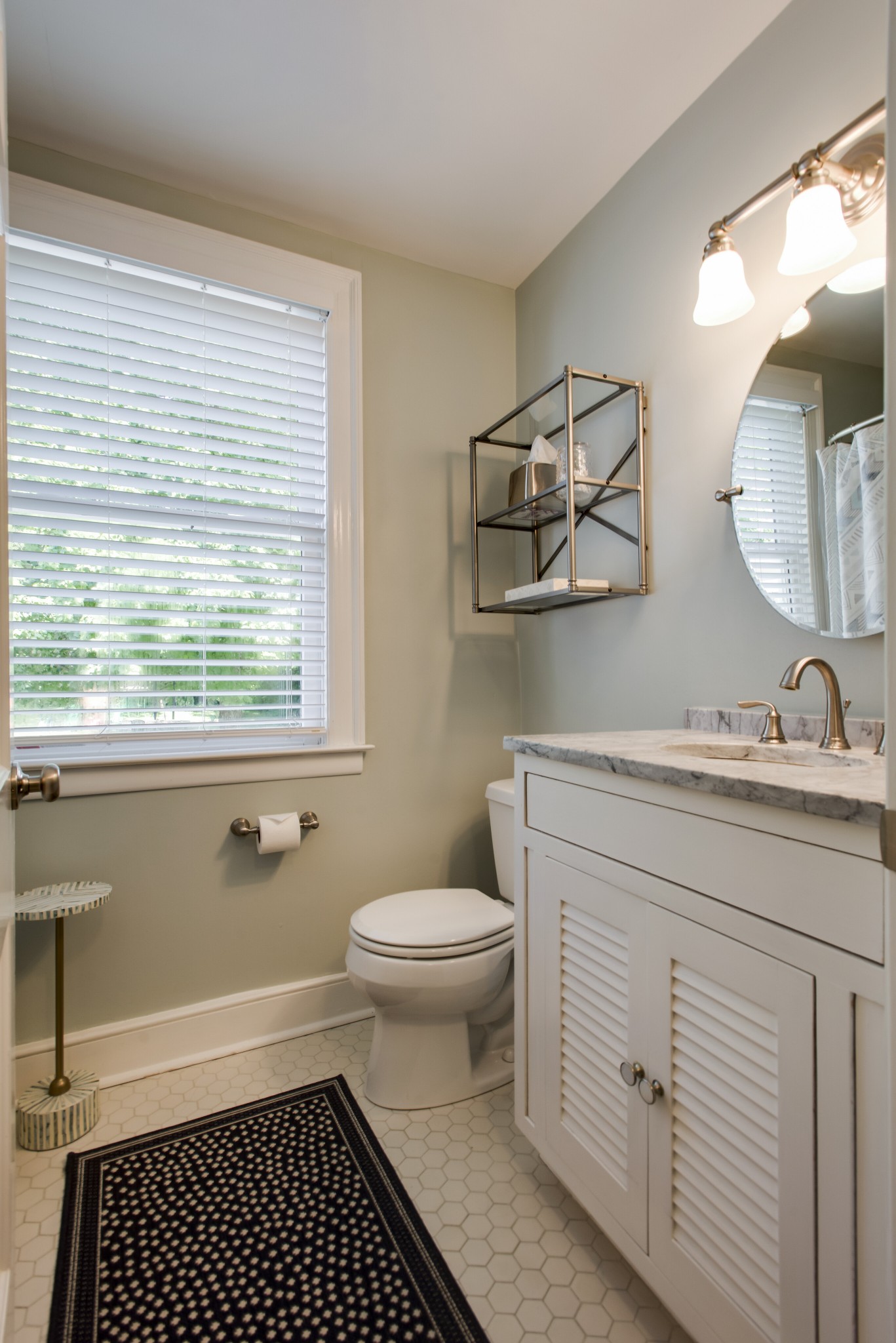 4105 Estes Road Nashville, TN 37215 - Photo 27 of 34 a bathroom with a sink a toilet and a window