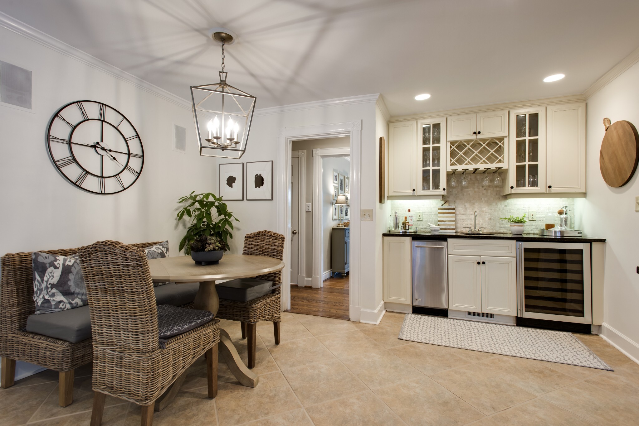 4105 Estes Road Nashville, TN 37215 - Photo 8 of 34 a kitchen with stainless steel appliances kitchen island granite countertop a table and chairs in it
