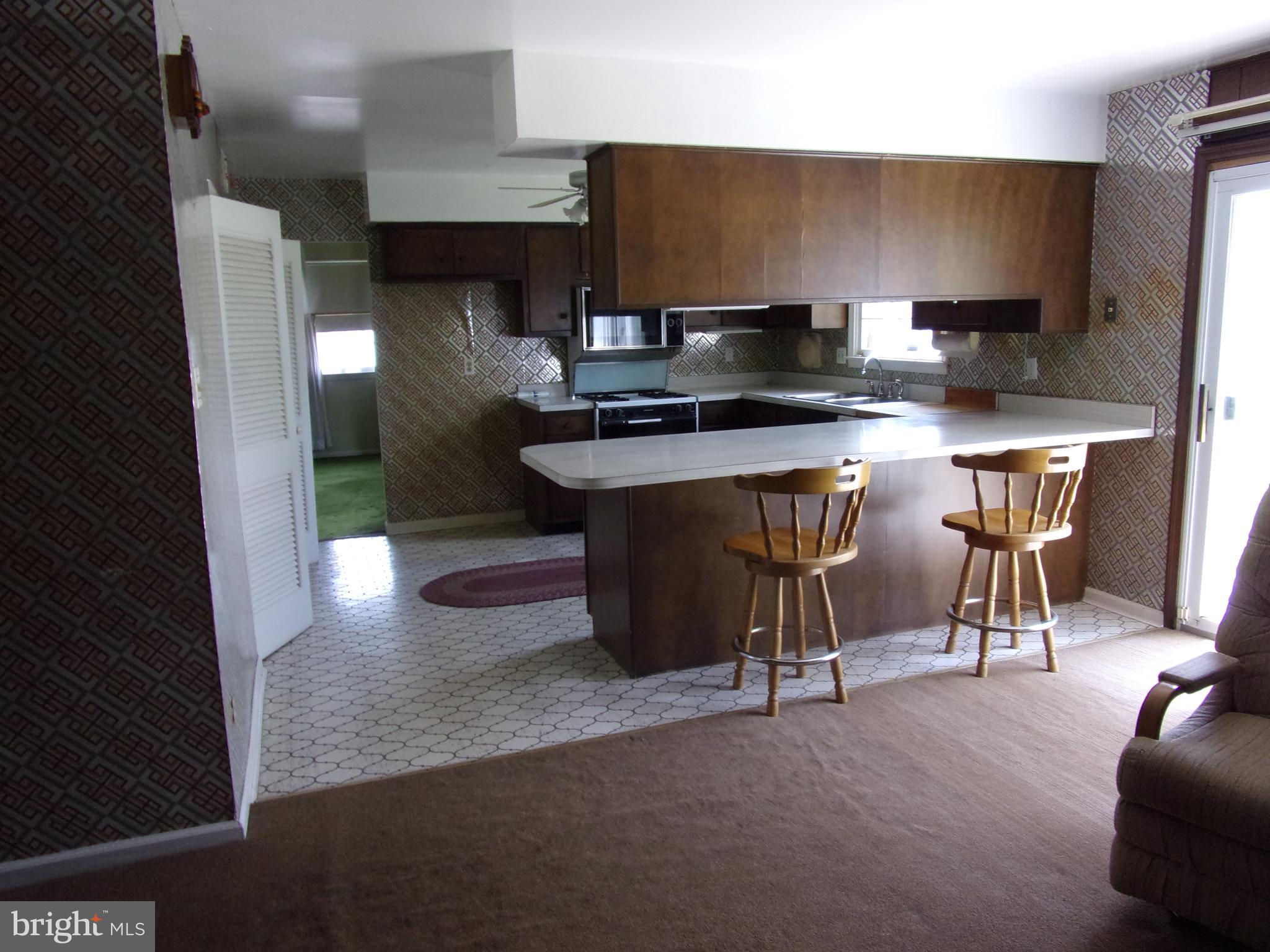 806 West Rolling Road Springfield, PA 19064 - Photo 17 of 39 View of kitchen from family room